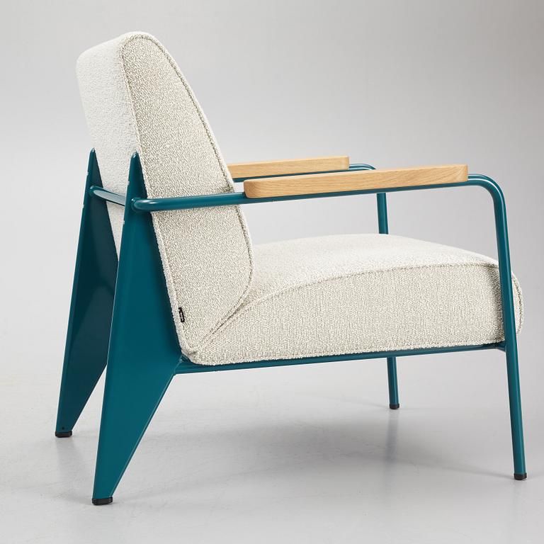 Jean Prouvé, a pair of "Fauteuil de Salon" armchairs, Vitra.