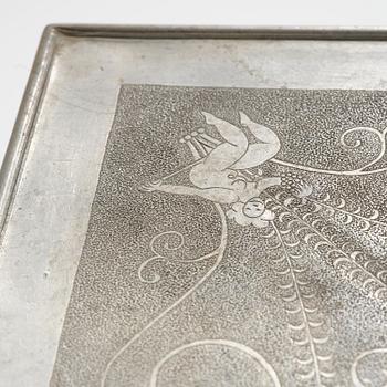 Anna Petrus, a pewter top tray table on a base by Uno Åhrén, executed in her studio, Stockholm, ca 1922-25.