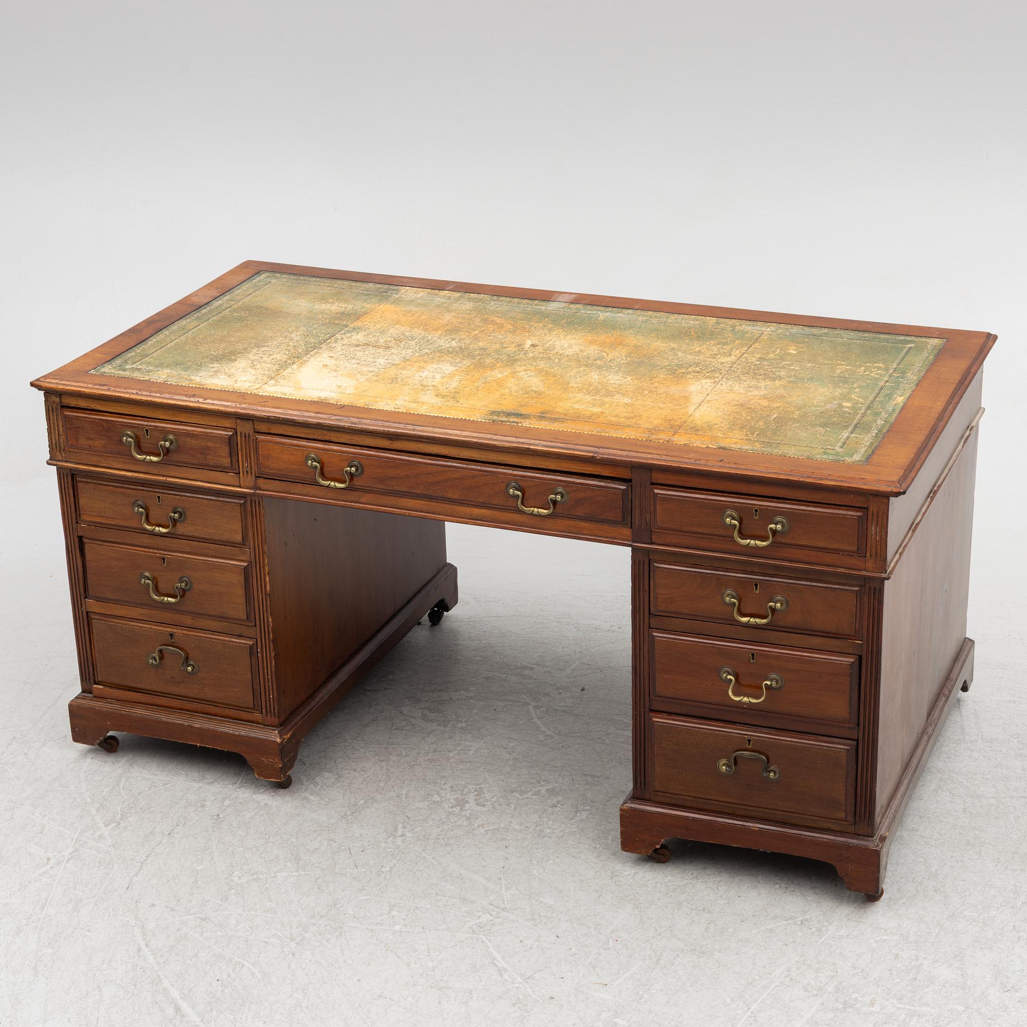 A 20th century writing desk, England.