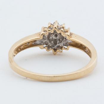 A 18K gold ring with diamonds,