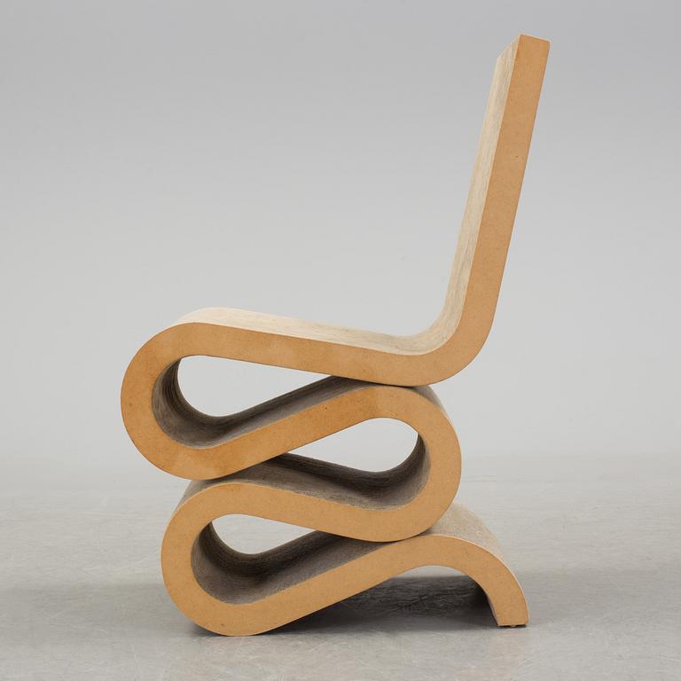 A 21 th century Frank O. Gehry "Wiggle Side Chair" for Vitra, Germany.