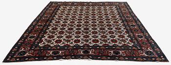 An antique Veramin carpet, West Persia, 380 x 271 cm.