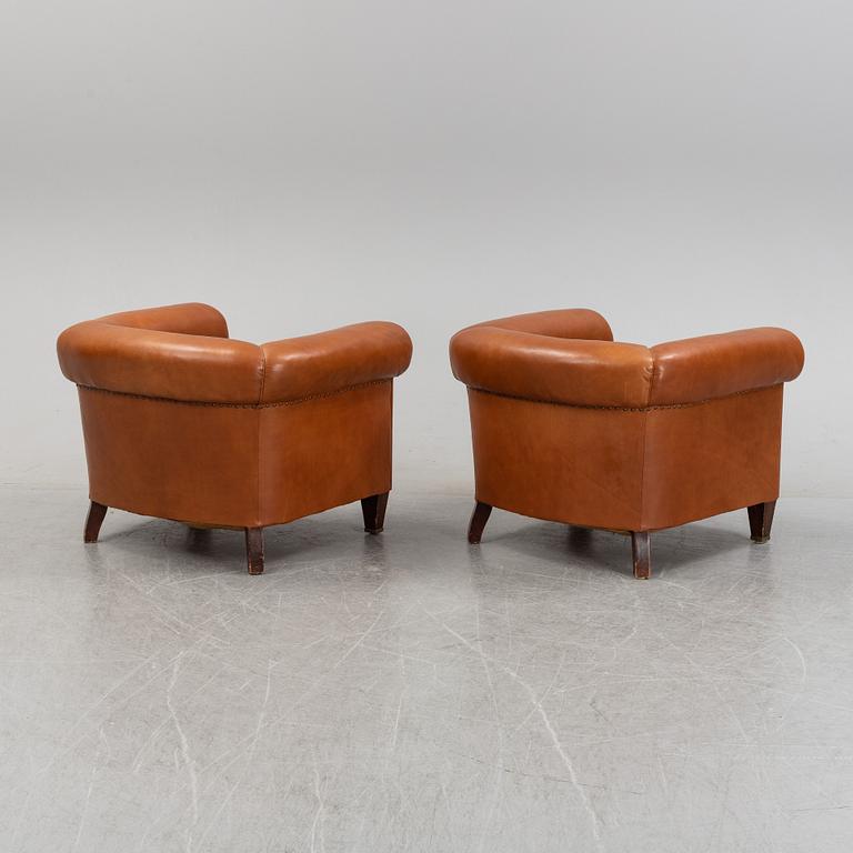 A pair of leather upholstered club chairs, 1930/40's.