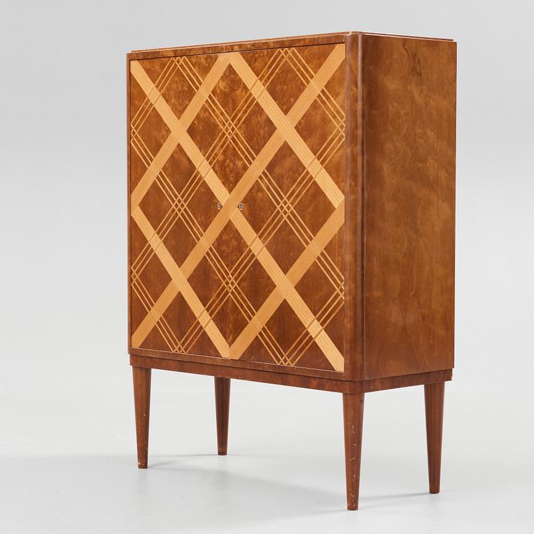 A Swedish 1950's cabinet, possibly by Oscar Nilsson.