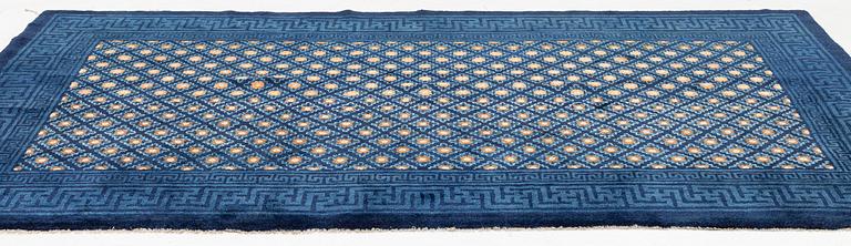 A semi-antique chinese Baotou rug, c 285 x 164 cm.