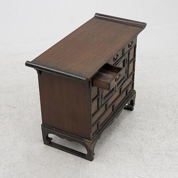 A Chinese hardwood cabinet, early 20th century.