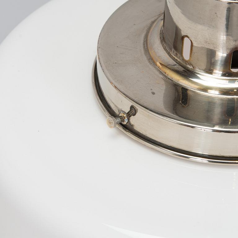 Paavo Tynell, kattovalaisin, malli 2004, Taito 1930-luku.