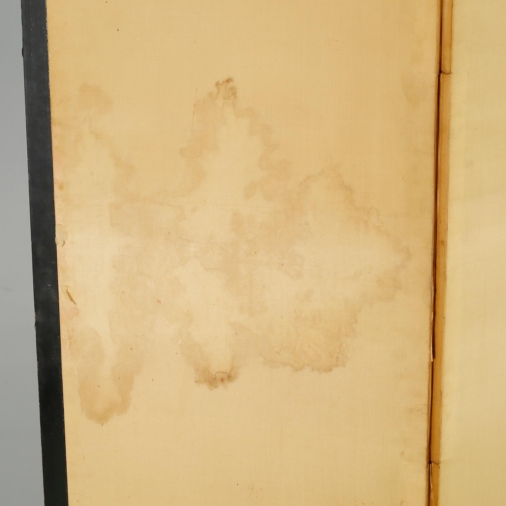 A 20th century folding screen.