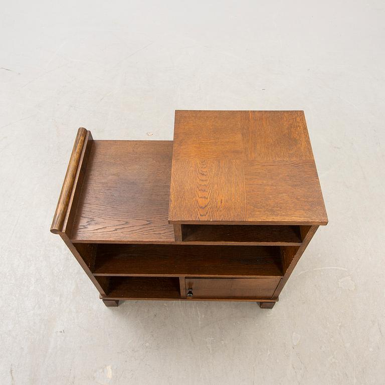 A 1940s Art Deco oak table.