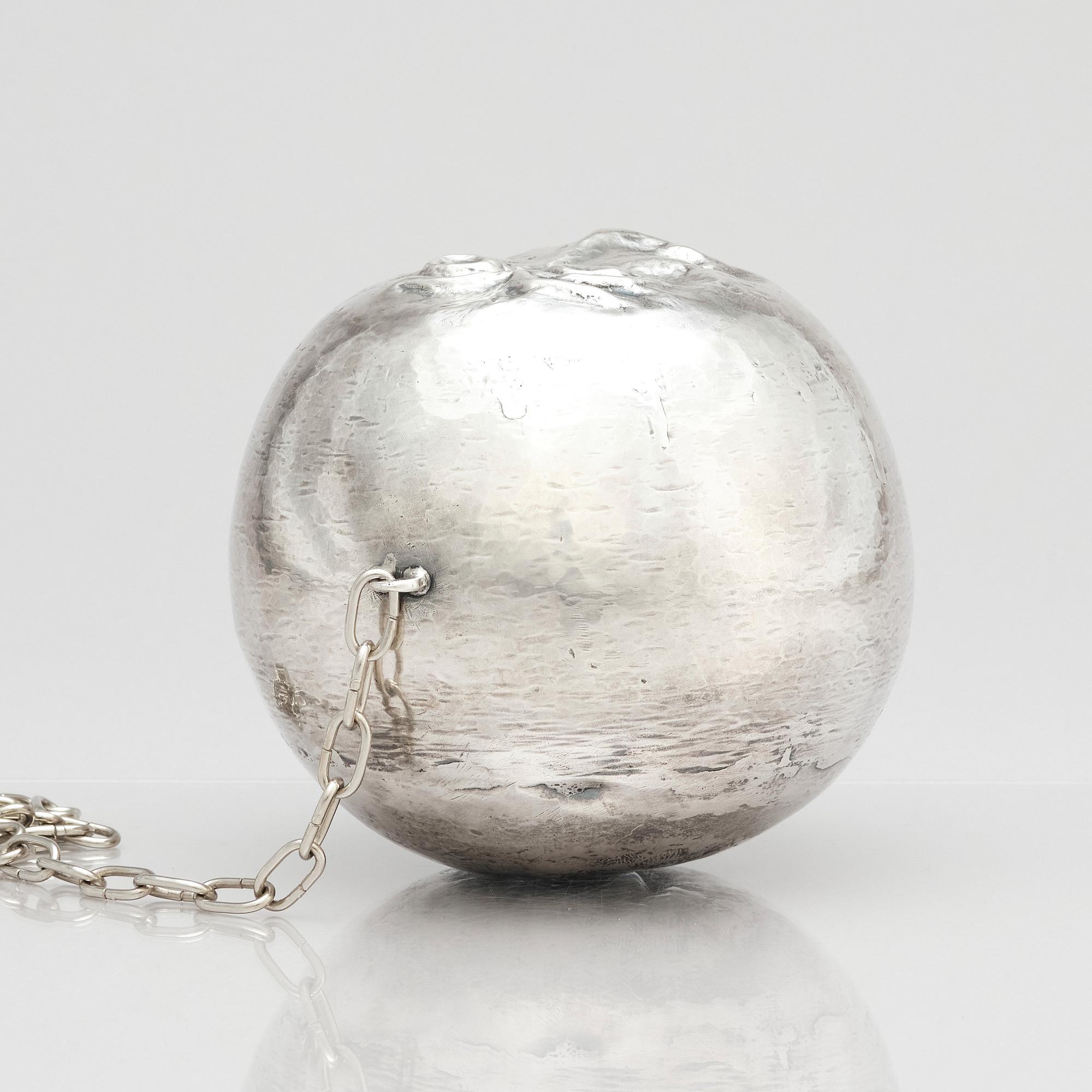 Olle Ohlsson, a silver 'man in the moon' sculpture, Stockholm.