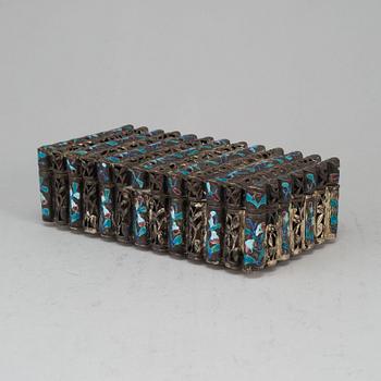 A Chinese copper plated with silver and alpaca and enamelled box with cover, 20th century.