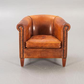 A leather easy chair later part of the 20th century.