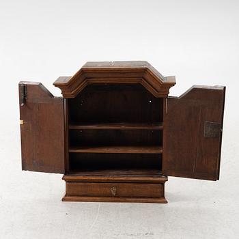 A wall cabinet, 18th century.