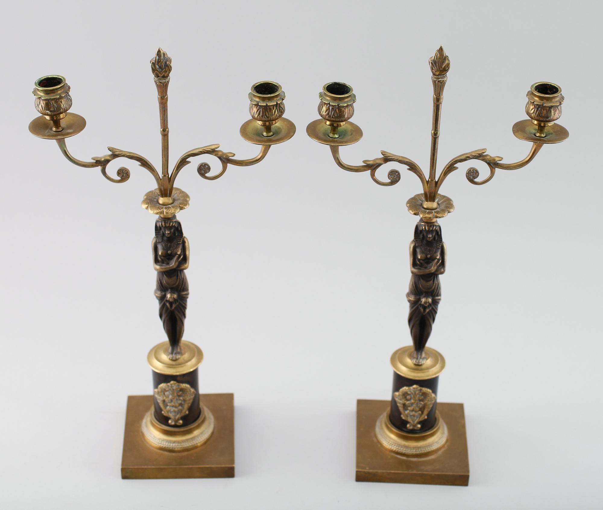 KANDELABRAR, 1 par, mässing och patinerad metall, empirestil, 1800-/1900-tal.