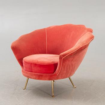 A 21st Edra century pink velvet easy chair.