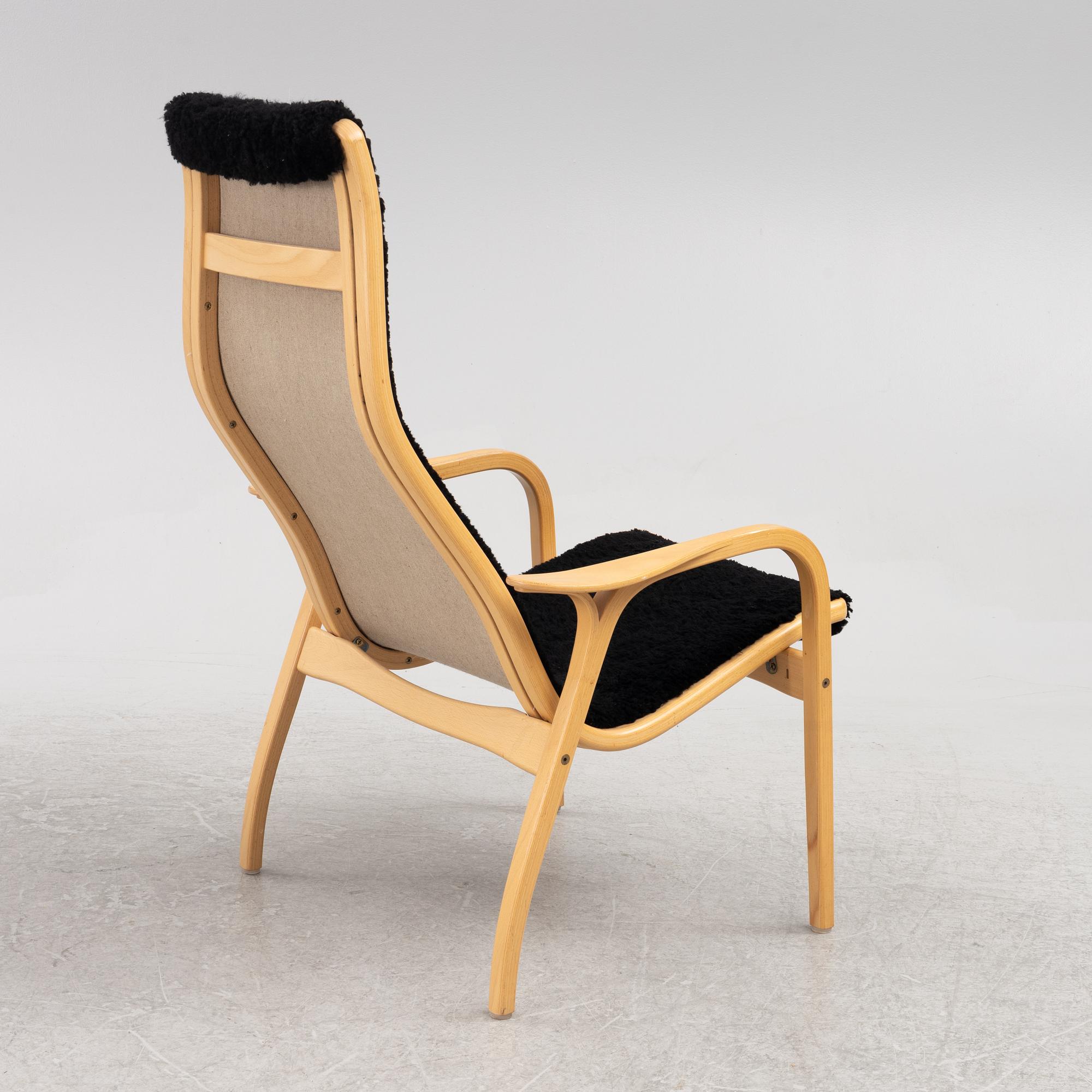 Yngve Ekström, an armchair and a footstool, "Lamino", Swedese, second half of the 20th century.