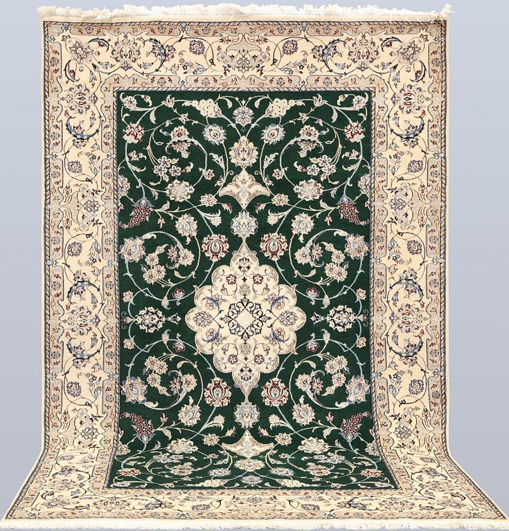 A part silk Nain rug, so-called 9LAA, approx. 257 x 161 cm.