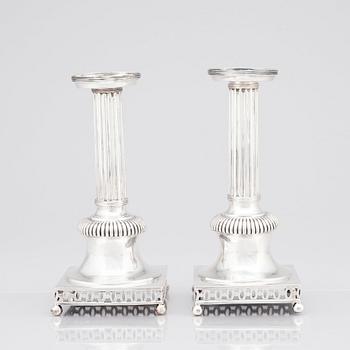 A pair of Swedish 18th century silver candlesticks, mark of Petter Eneroth, Stockholm 1800.