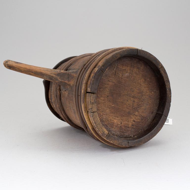 A WOODEN JUG, 18th/19th century.