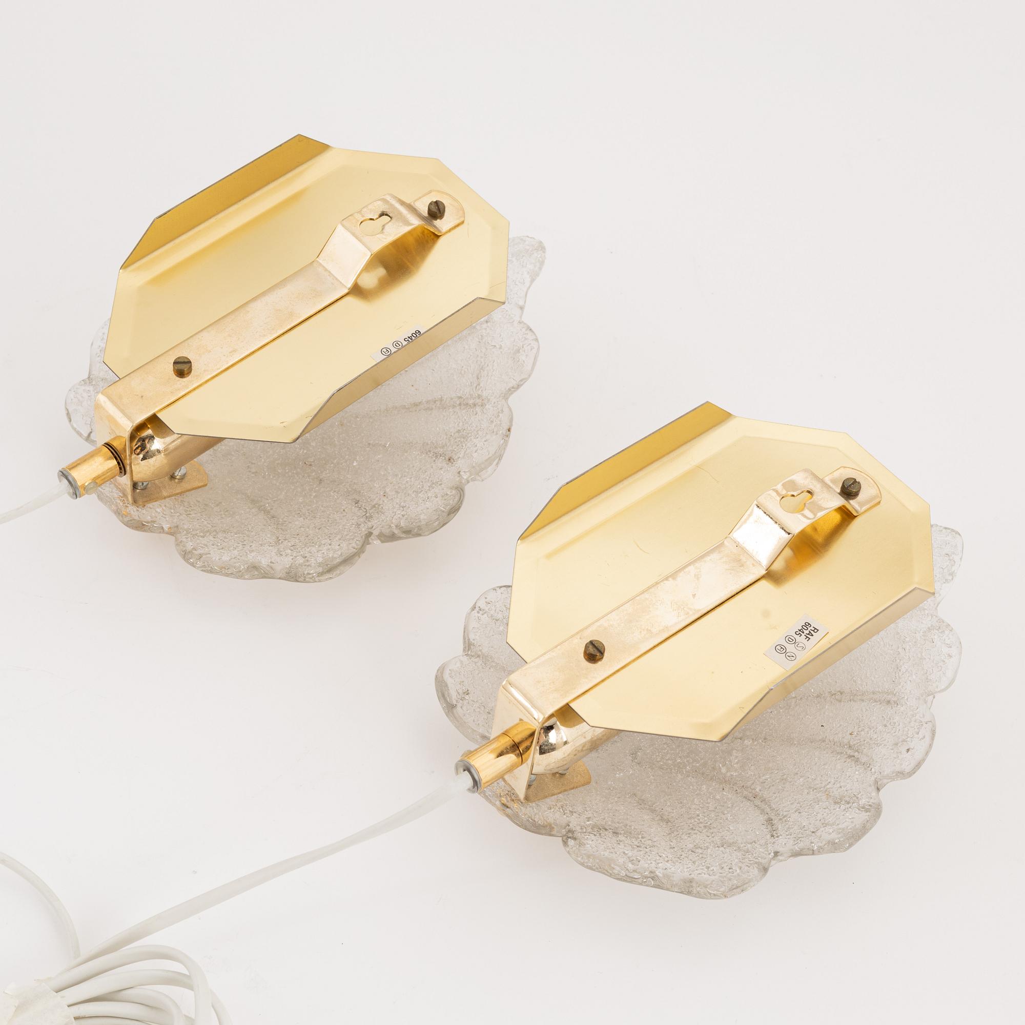 A pair of brass and glass wall lamps, Rejmyre Armaturfabrik, second half of the 20th century.