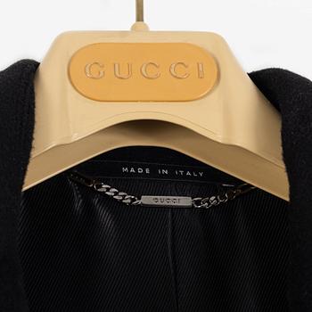 Gucci, a black wool and cashmere mix coat, 2001, Italian size 38.