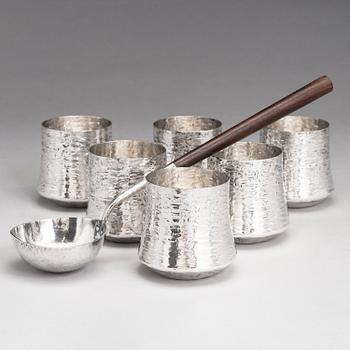 TAPIO WIRKKALA, A silver punch ladle and six silver beakers, marked TW,  Kultakeskus, Hämeenlinna, Finland 1976 an 1974.