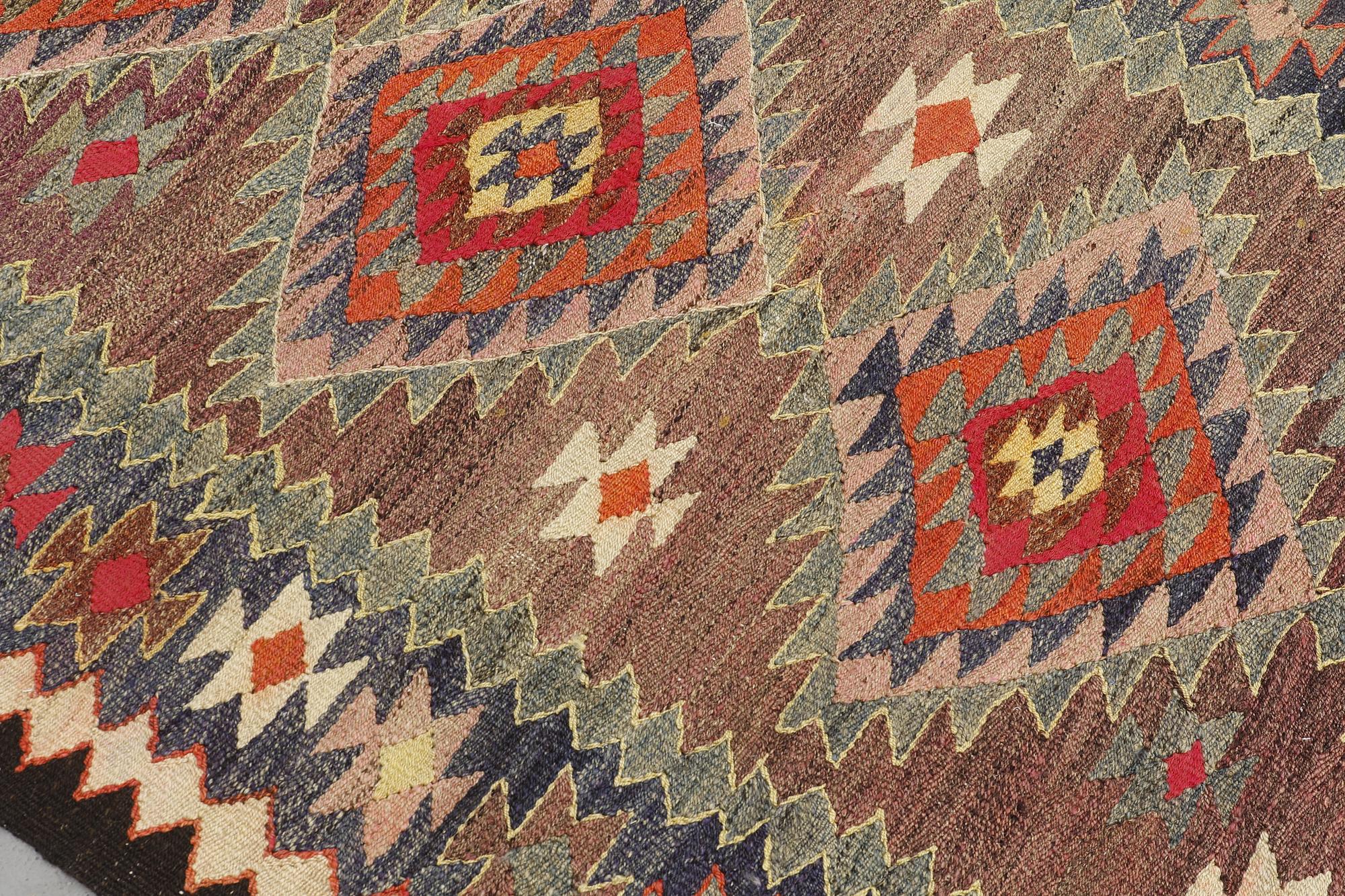 A Kelim rug, c. 253 x 120 cm.