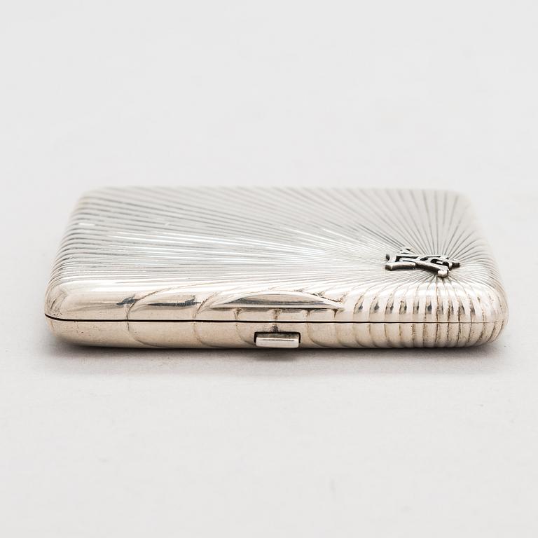 A silver cigarette case, maker's mark of Johan Allenius, Saint Petersburg, Russia 1898.