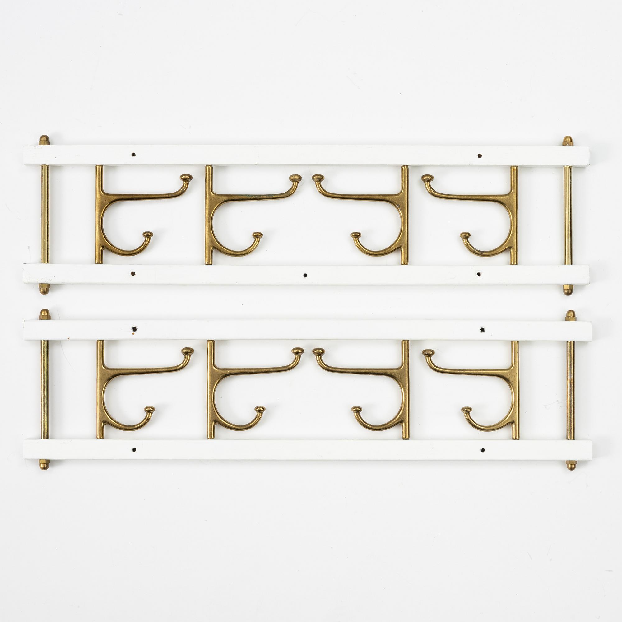 Klädhängare, ett par, "Dekorativ", Skoglunds metallgjuteri, Anderstorp, 1950-/60-tal.