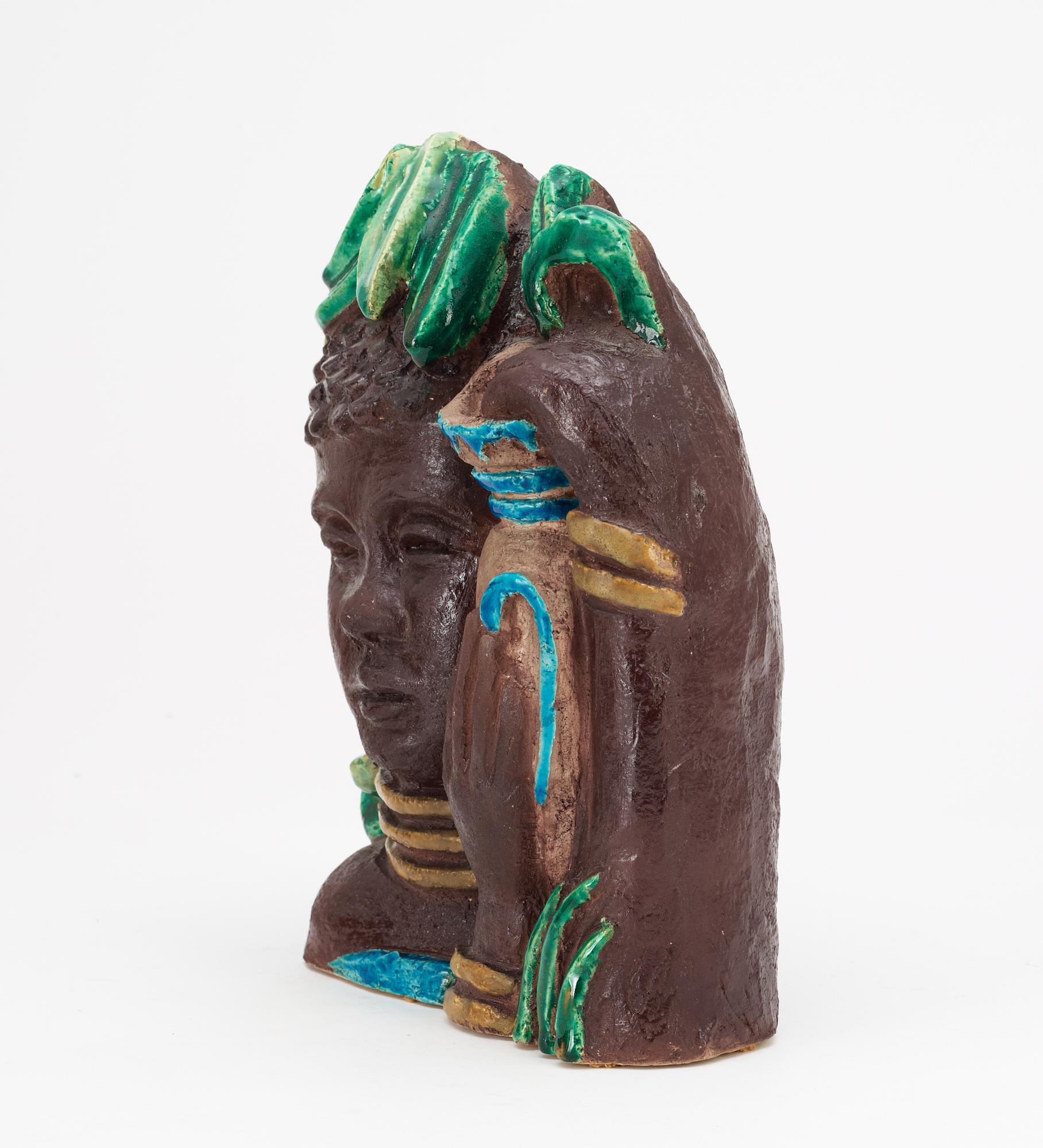 A Gunnar Nylund stoneware sculpture of a water carrier, Rörstrand.