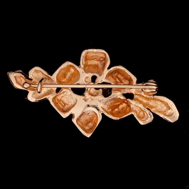 BROSCH, 14K guld, 4 diamanter tot. 0,03 ct. Vikt ca 6 g.