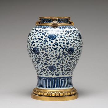 A blue and white bronze mounted vase, Qing dynasty, 18th Century.