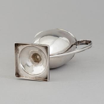 A London silver creamer dated 1795, possibly by Abraham Taylor.