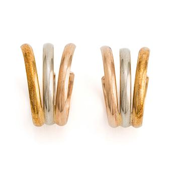 501. A pair of 18K gold Cartier earrings.