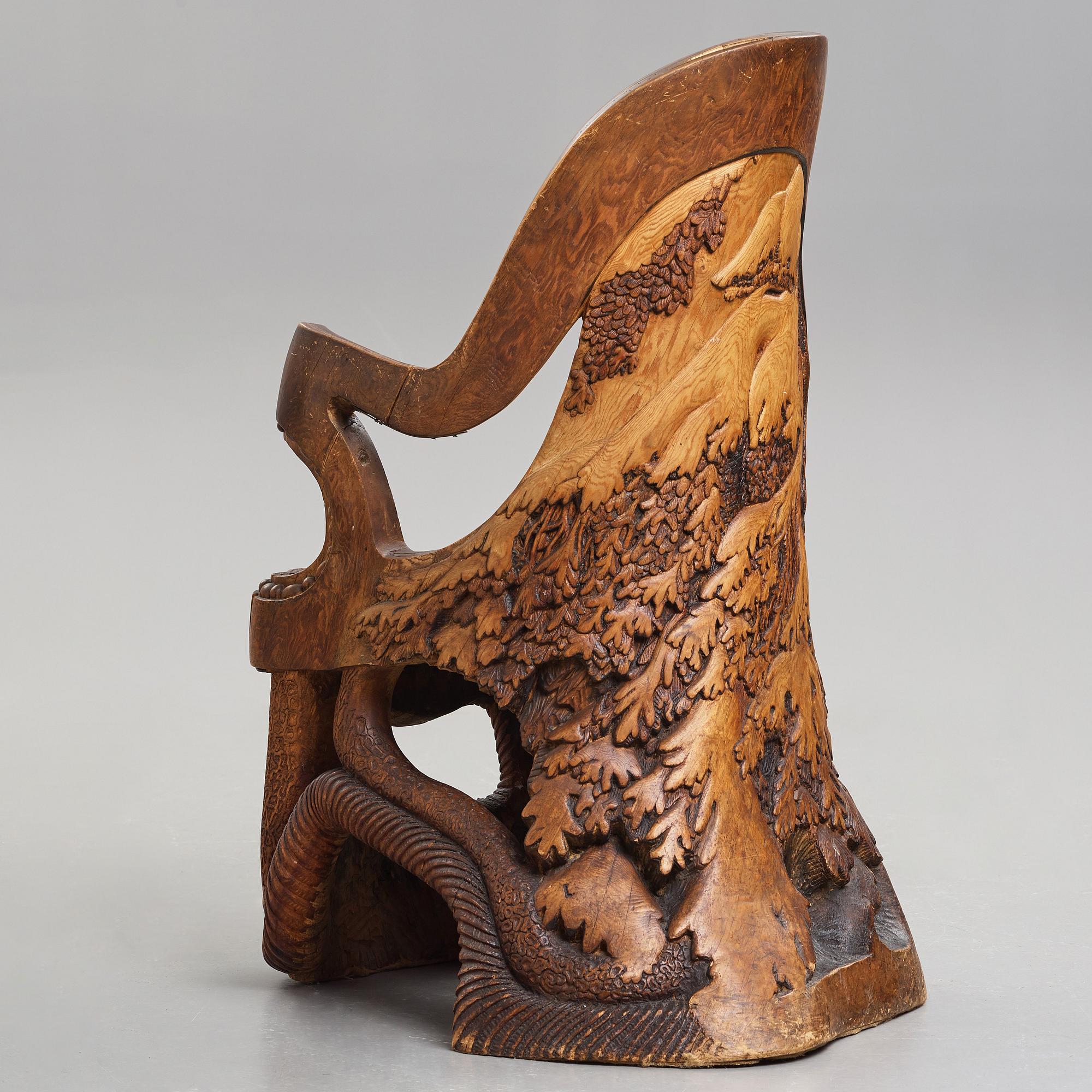 Knut Fjaestad, an Art Nouveau sculptured and carved pine throne, Sweden early 20th century.
