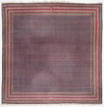 A oriental carpet, signed, c. 295 x 295 cm.