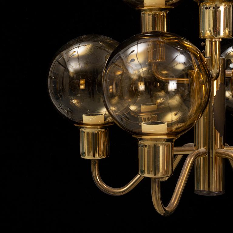Hans-Agne Jakobsson, a late 20th century brass and glass ceiling lamp for nine lights, Markaryd, Sweden.