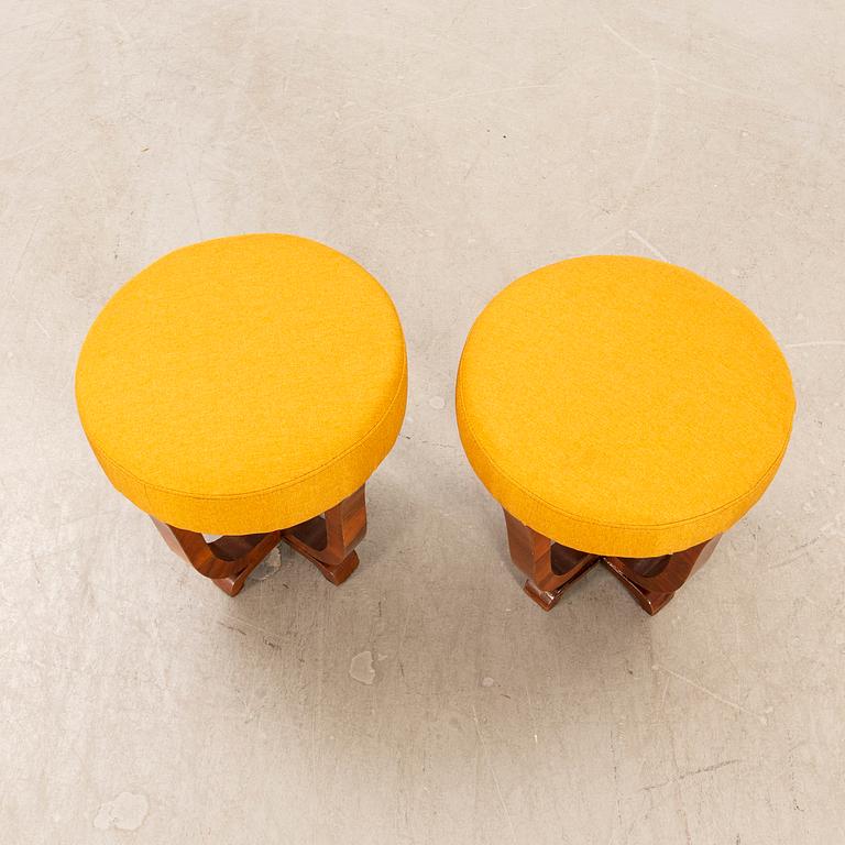 a set of two Art Deco walnut stools first half of the 20th century.