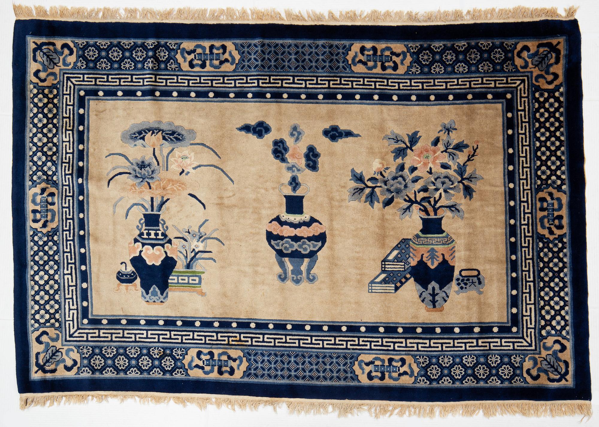 A Carpet, old China, "antique finish" ca 197 x 133 cm.