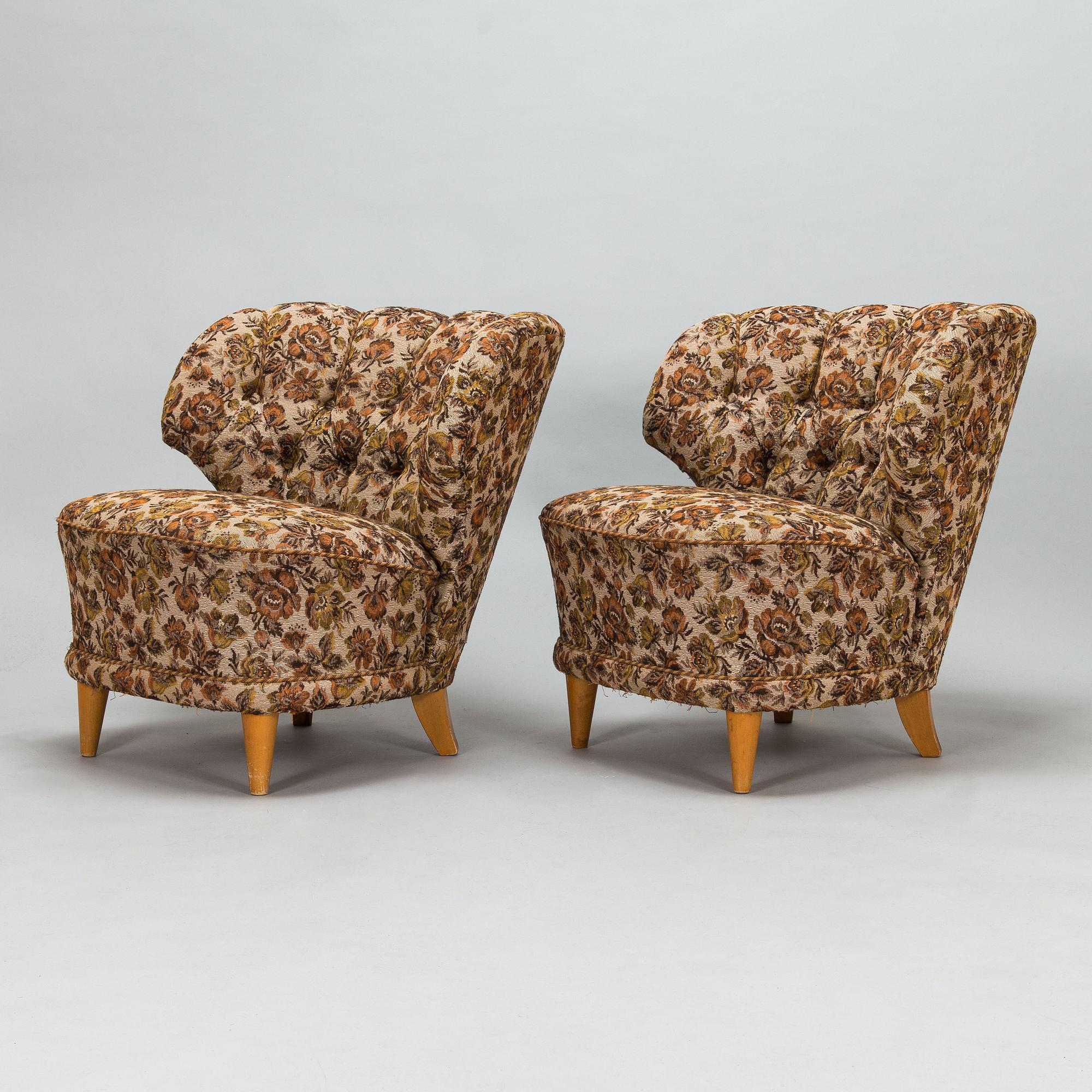A pair of 1950's armchairs.