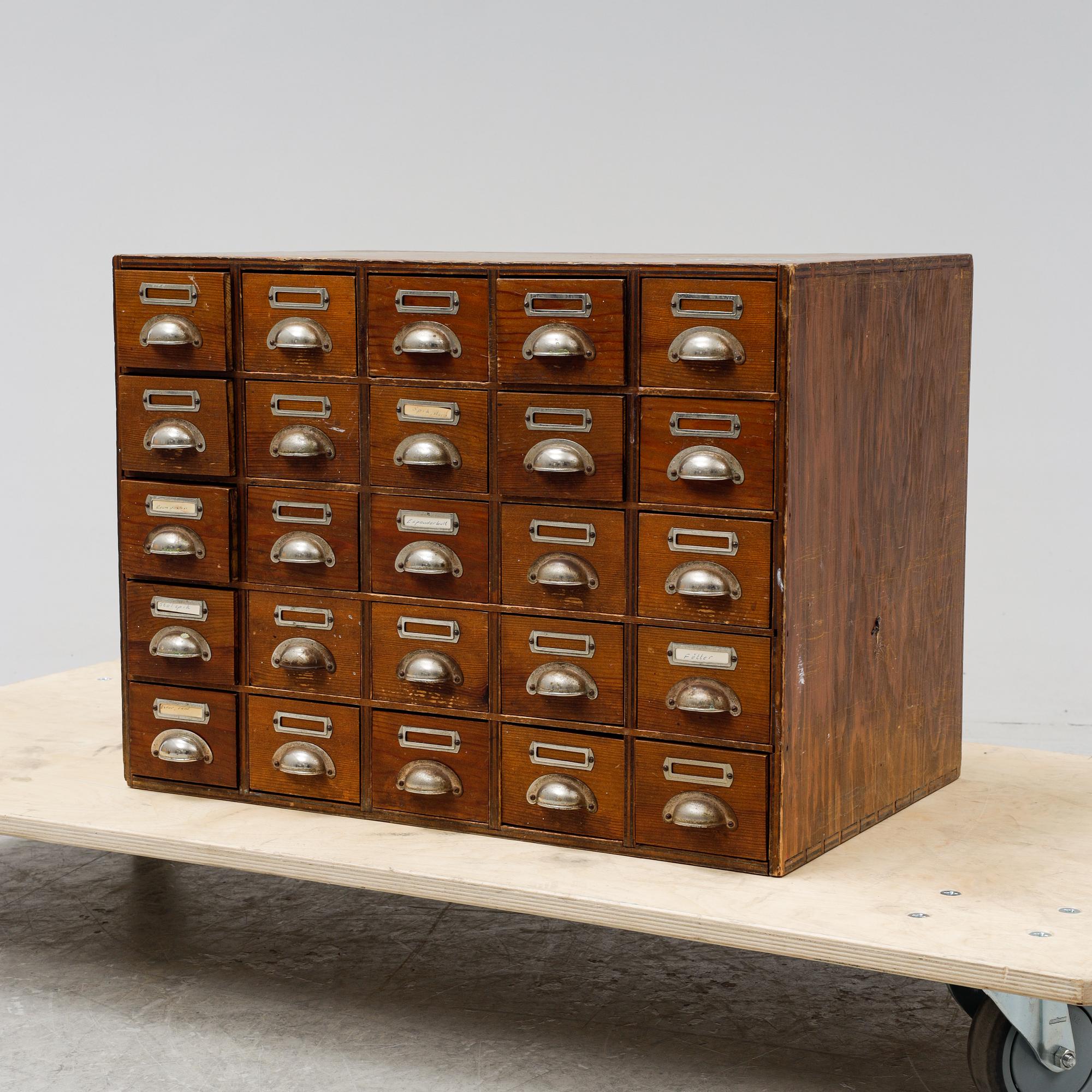 A pine cabinet with drawers, first half of the 20th Century.