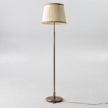 A brass floor lamp, 1940s.