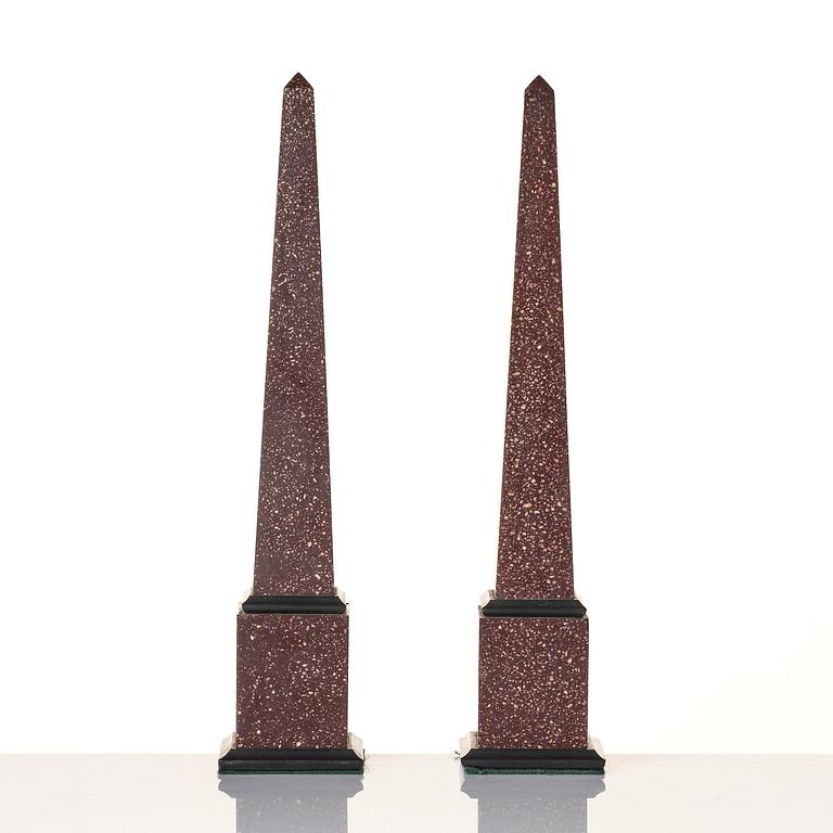A pair of Egyptian porphyry obelisks 20 th century.