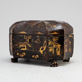 A Chinese tin case in a wooden box, early 20th century.