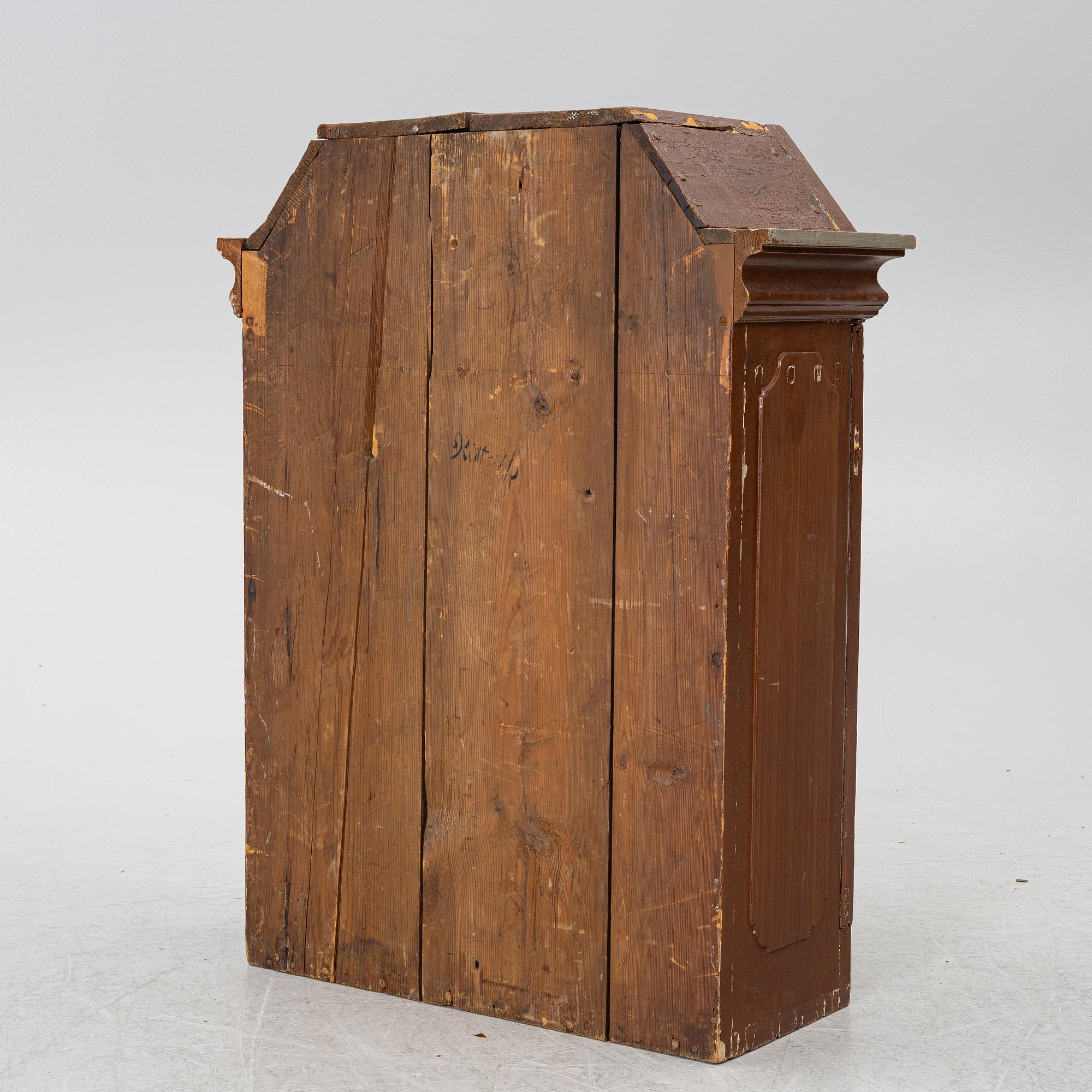 A cabinet, dated 1824.