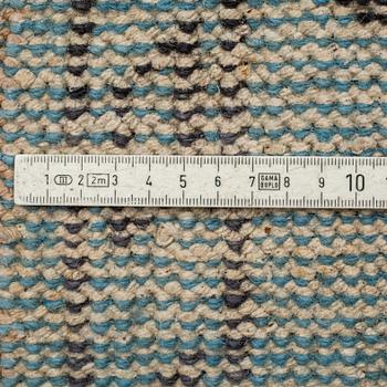 An oriental carpet, ca 365 x 264 cm.