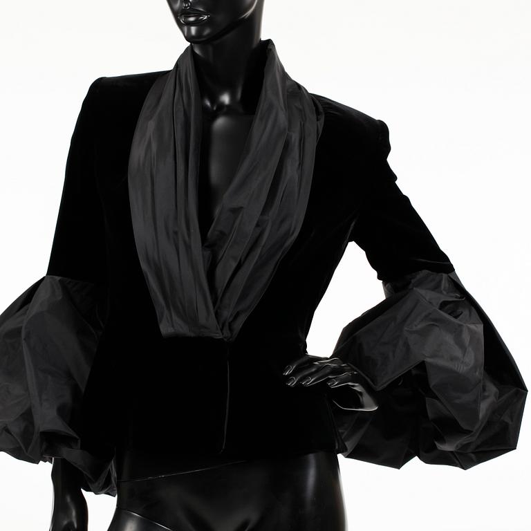 ARMANI, a black velvet evening jacket with silk details.
