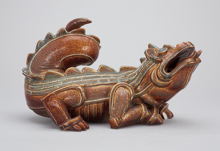 A Wilhelm Kåge stoneware figure of a dragon, Gustavsberg circa 1940.