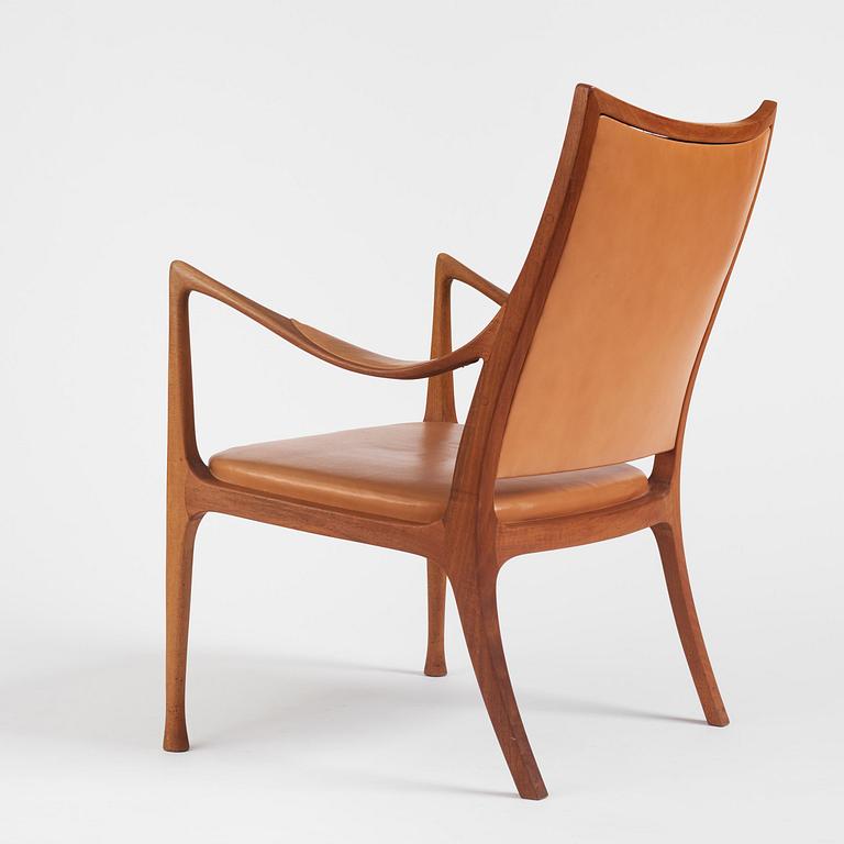 Hans Asplund, a walnut and leather easy chair, Nordiska Kompaniet, ca 1955, for the Nordiska Kompaniet beauty salon.