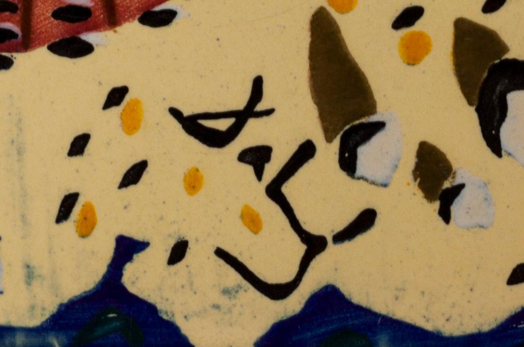 A set of six earthenware tile plates, after Salvador Dalí, late 20th century.